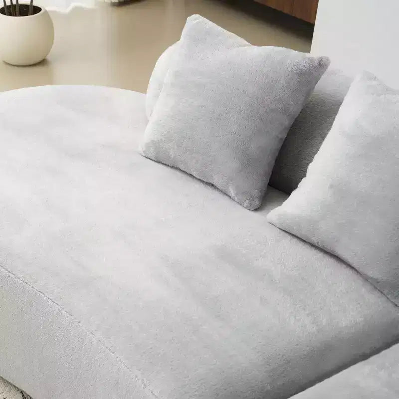Canapé en flanelle courbé, moderne et simple. Multicolore créatif pour le salon, avec une combinaison de coussins.