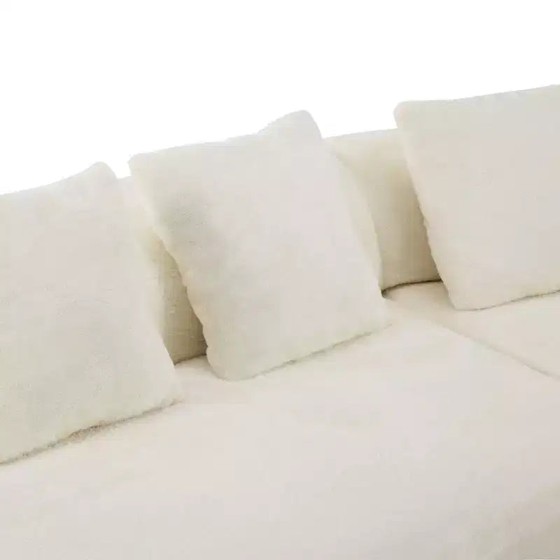 Canapé en flanelle courbé, moderne et simple. Multicolore créatif pour le salon, avec une combinaison de coussins.