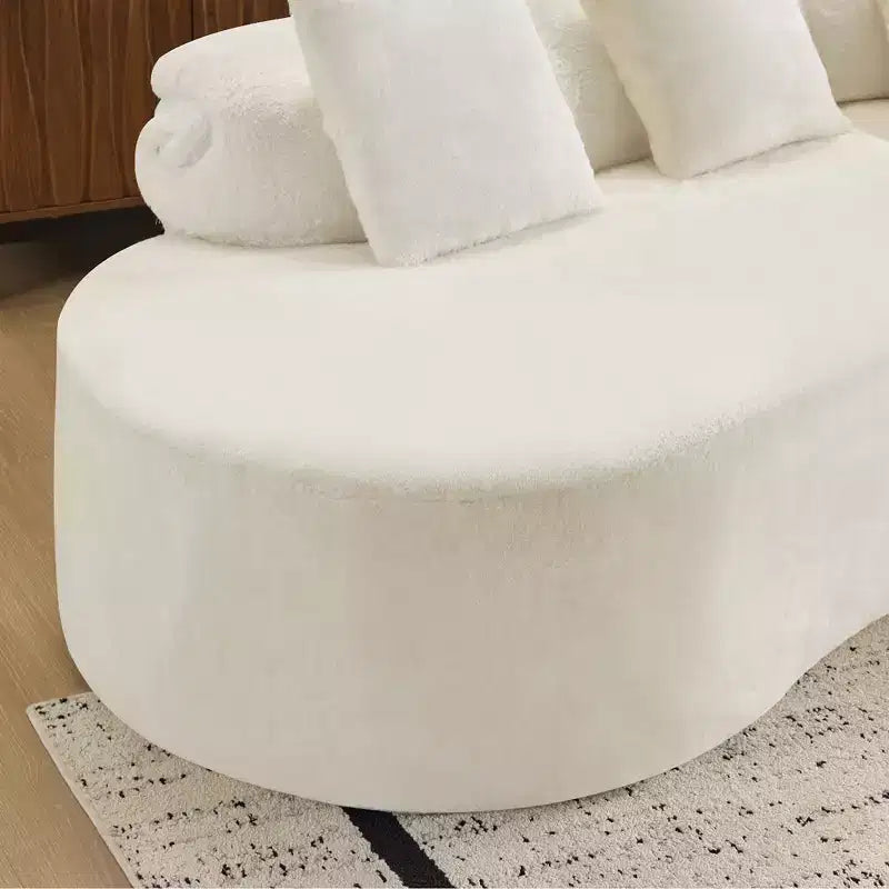 Canapé en flanelle courbé, moderne et simple. Multicolore créatif pour le salon, avec une combinaison de coussins.