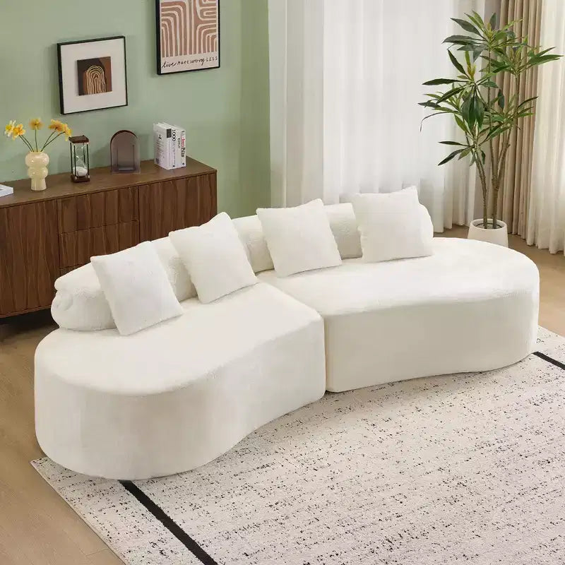 Canapé en flanelle courbé, moderne et simple. Multicolore créatif pour le salon, avec une combinaison de coussins.