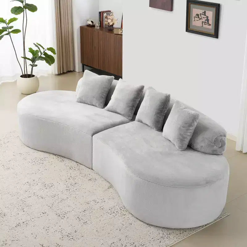 Canapé en flanelle courbé, moderne et simple. Multicolore créatif pour le salon, avec une combinaison de coussins.