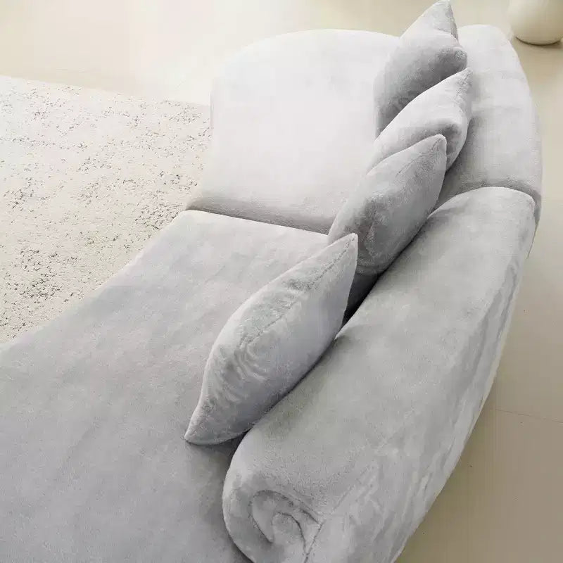 Canapé en flanelle courbé, moderne et simple. Multicolore créatif pour le salon, avec une combinaison de coussins.