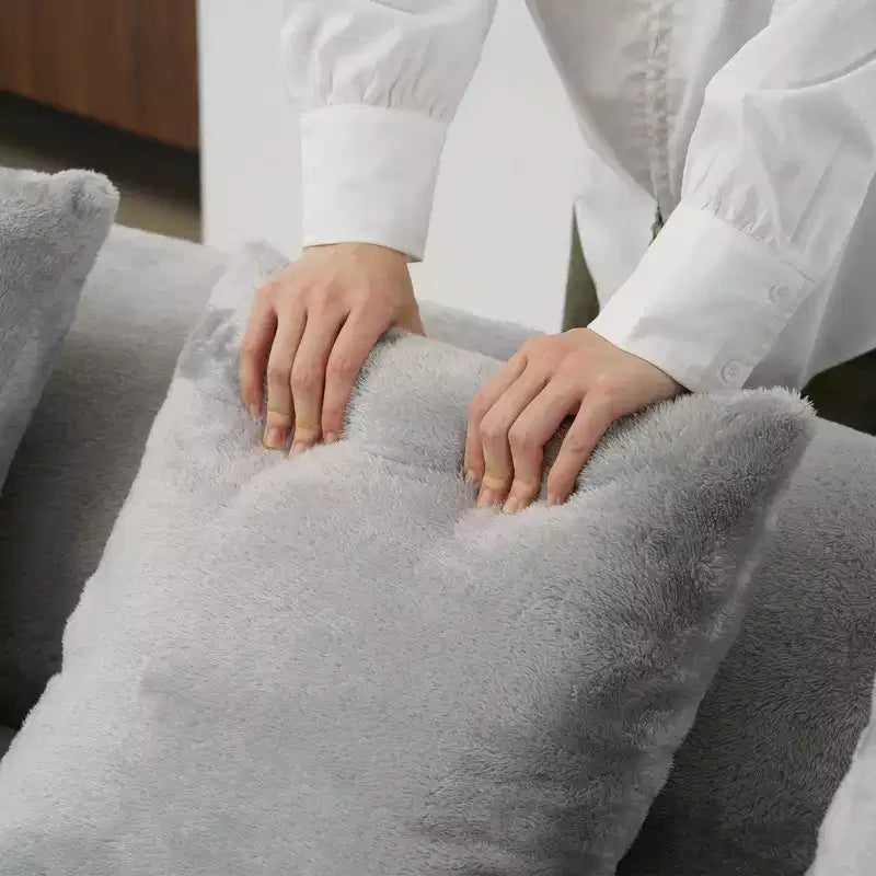 Canapé en flanelle courbé, moderne et simple. Multicolore créatif pour le salon, avec une combinaison de coussins.