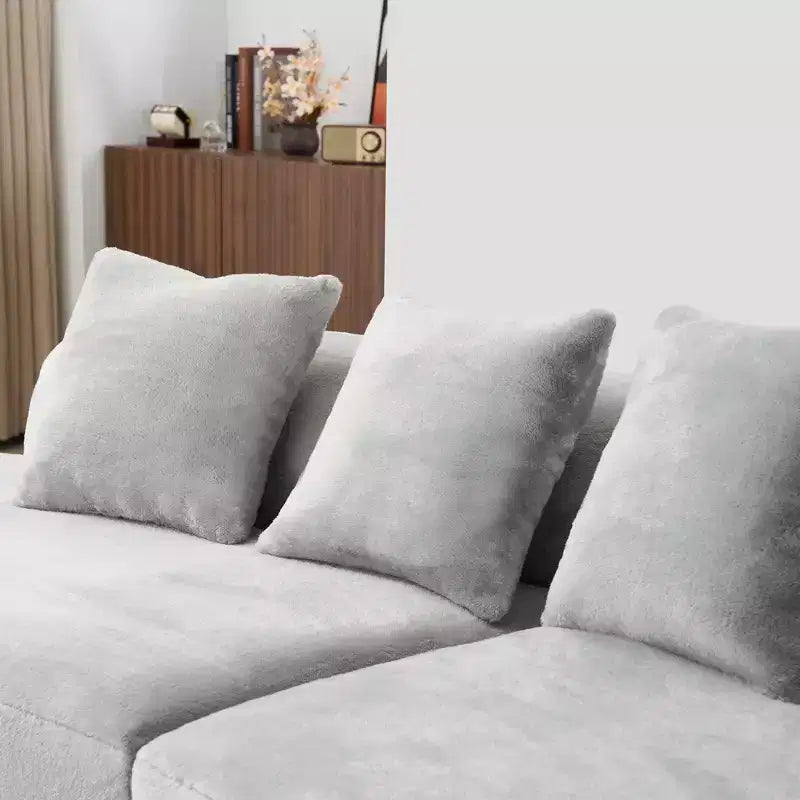 Canapé en flanelle courbé, moderne et simple. Multicolore créatif pour le salon, avec une combinaison de coussins.