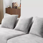 Canapé en flanelle courbé, moderne et simple. Multicolore créatif pour le salon, avec une combinaison de coussins.
