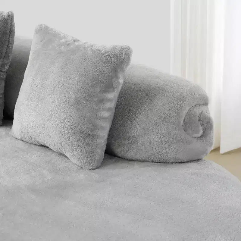 Canapé en flanelle courbé, moderne et simple. Multicolore créatif pour le salon, avec une combinaison de coussins.