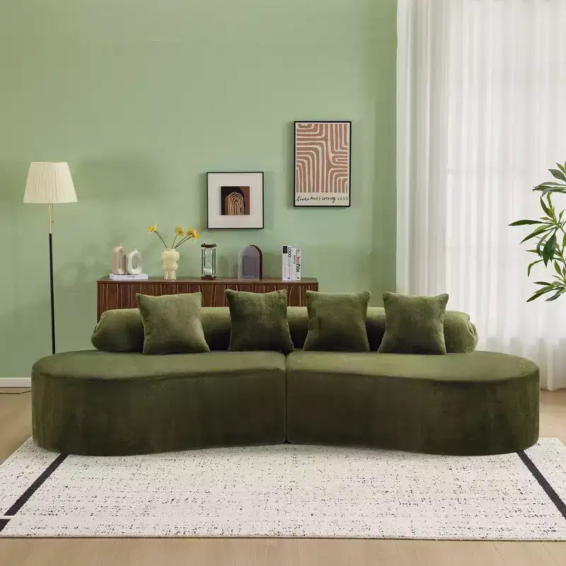 Modern and simple curved flannelette sofa. Creative multi-seater for the living room, with a combination of pillows.